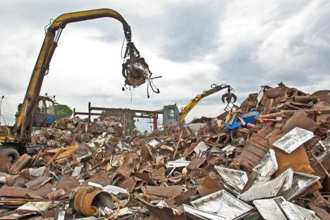 Sorting and loading of scrap metal. Stock Photos