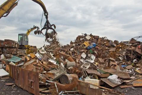 Sorting and loading of scrap metal. Stock Photos