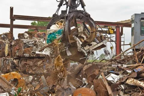 Sorting and loading of scrap metal. Stock Photos