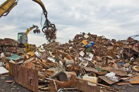 Sorting and loading of scrap metal. Stock Photos