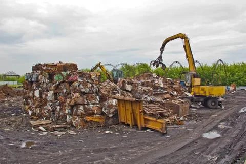 Sorting and loading of scrap metal. Stock Photos