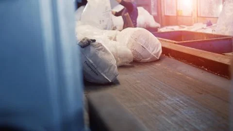 Sorting and recycling of garbage, cellophane, workers sort garbage in a Foto stock