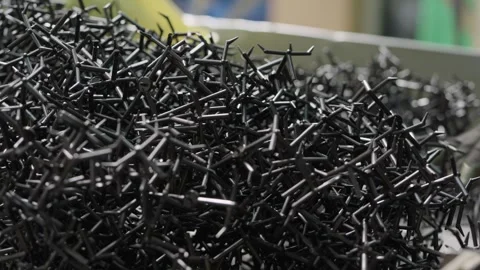Sorting black plastic scraps before shredding into pellets Stock Footage 334268629