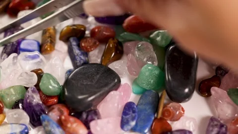 Sorting Chakra Stones with Tweezers Stock-Footage 312241420