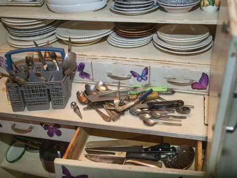 Sorting clean and dirty tableware Stock Photos