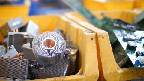 Sorting computer components in recycle center. Close up of radiators Video stock 105644689