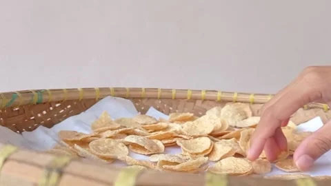 Sorting the crunchy snack on a basin Stock Footage 149709859