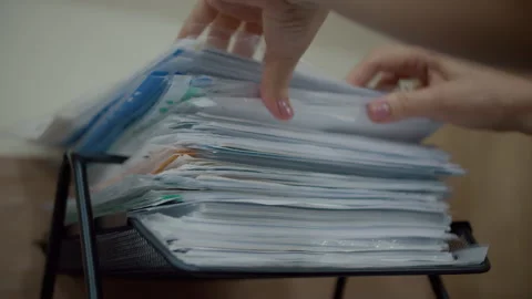 Sorting documents in office tray Stock Footage 311186628