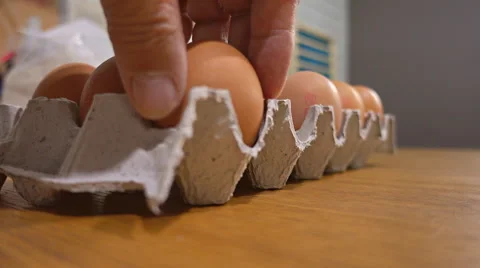 Sorting eggs in the egg tray Video stock 64790653