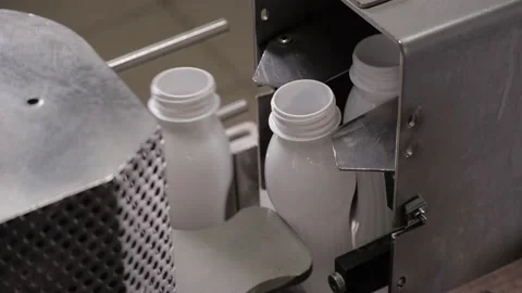 Sorting of empty pet bottles for dairy products Stock Footage 170668438