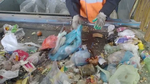 Sorting of garbage on the conveyor of the waste recycling plant, Russia Stock Footage 101948870