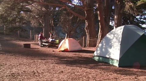 Sorting gear in a campsite Stock Footage 44237496