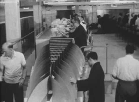 SORTING LETTERS, AUSTRALIAN MAIL CENTRE (1960s) Stock Footage 153457446
