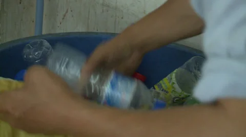 Sorting plastic bottles for recycling Stock Footage 37698122