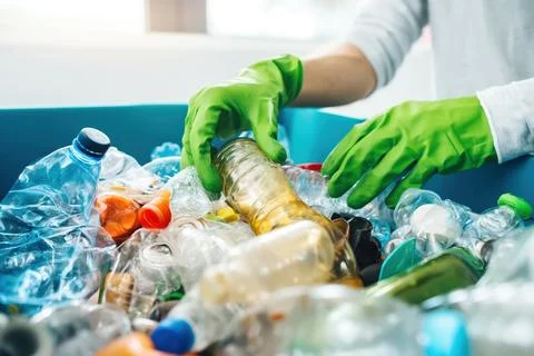 Sorting recyclable materials with gloves in a clean space Fotos Stock