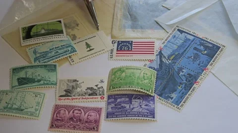 Sorting Stamps Stock Footage 61886685