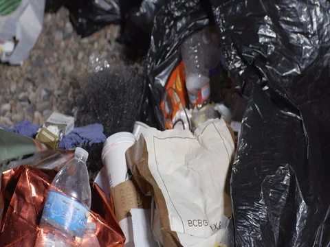 Sorting Through Trash Stock Footage 71222556