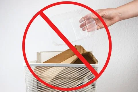 Sorting the trash. used plastic container in the trash can Foto stock