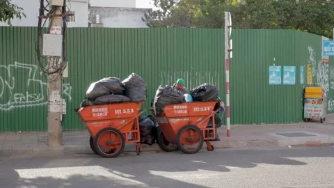 Sorting waste from large carts Stock-Footage 262533474