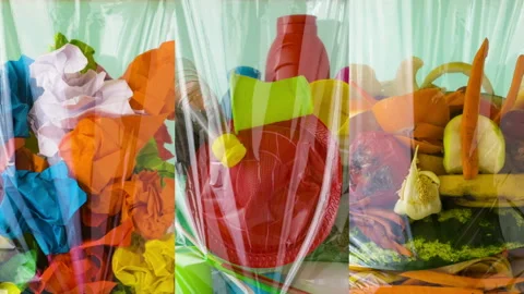 Sorting waste. Paper, plastic and food scraps Stock Footage 93877185