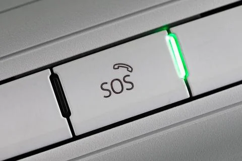 .SOS button on the ceiling car interior Stock Photos