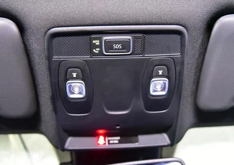 SOS button on the ceiling car interior Stock Photos