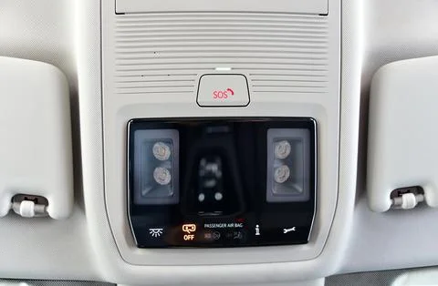 SOS button on the ceiling car interior Stock Photos
