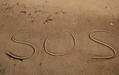 Sos help beach Stock Photos