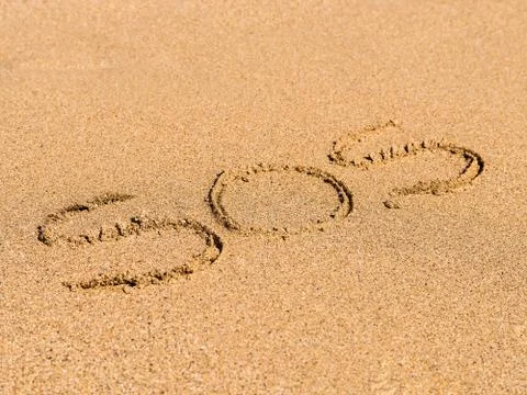 SOS Help Cry For Help On Beach Stock Photos