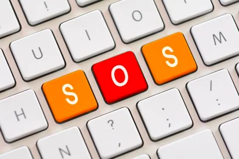 SOS on keyboard Stock Photos