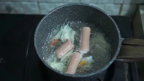 Sosis in the pan Stock Footage 218429126