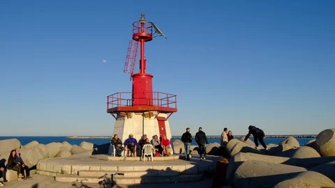 Sottomarina - The lighthouse at the "diga" - Motion view Stock Footage 73526562