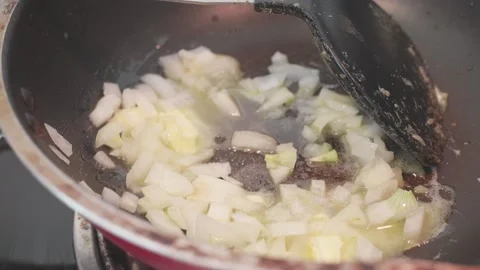 Souce Onions in a Pan Stock Footage 318938663