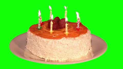 Souffle cake with fruit and eight lighting candles on plate Stock Footage 47534585