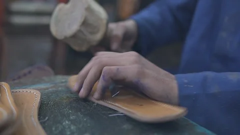 Souk Marrakech Morocco crafting sole shoes typical production hands working Stock Footage 87467862