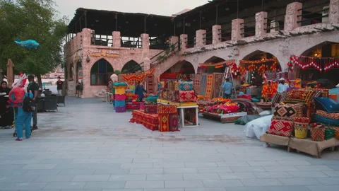 Souk Waqif Doha, Qatar main street shot showing  traditional Arabic textile shop Stock Footage 143547247