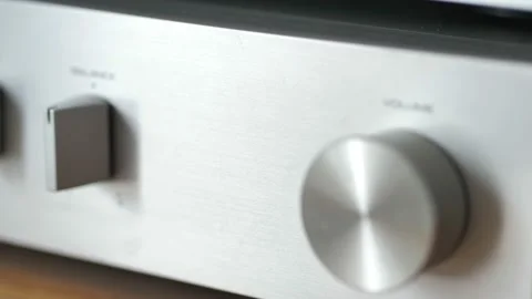 Sound amplifier knobs in close-up, camera panes sideways. Setting the volume, 動画素材 156786657