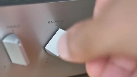 Sound amplifier knobs in close-up, camera panes sideways. Video stock 157269412