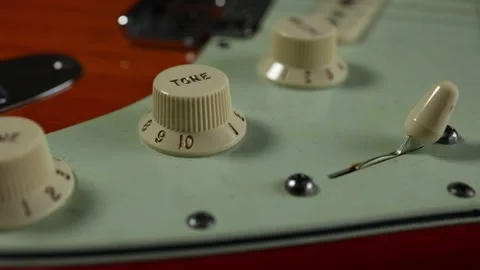 Sound and volume control of an electric guitar with pickup switch Video stock 280234510