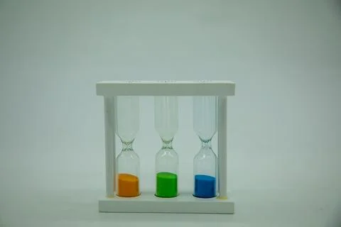 Sound clock with a different time in a white background Stock-Fotos