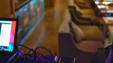 Sound control panel and microphone in a restaurant, sound engineer does his job Stock Footage 146955797
