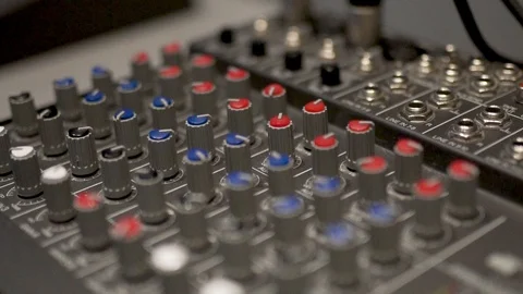 Sound control panel, toggle switches sound controls female hand turns the toggle 库存影片 124879356