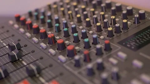 Sound control panel, toggle switches sound controls female hand turns the toggle 库存影片 124879414