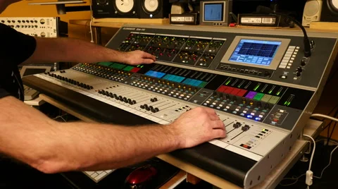 Sound designer working in a recording studio on an audio mixer sistem, Full HD Stock Footage 60695224