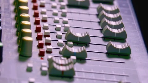 Sound engineer adjust levers and knobs for stage sound check Stock Footage 115498158