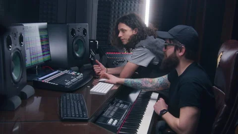 Sound engineer and singer create song on computer 스톡 동영상 238993474