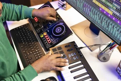 Sound engineer artist adding effects on his audio files in post production Fotos de archivo