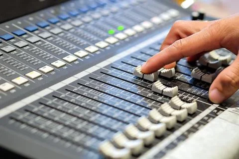 Sound engineer control mixed audio Stock Photos