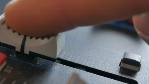 Sound engineer, DJ is adjusting the volume of the sound. Stock Footage 108628922