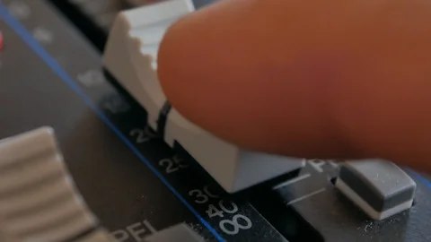 Sound engineer, DJ is adjusting the volume of the sound. Stock Footage 108629145